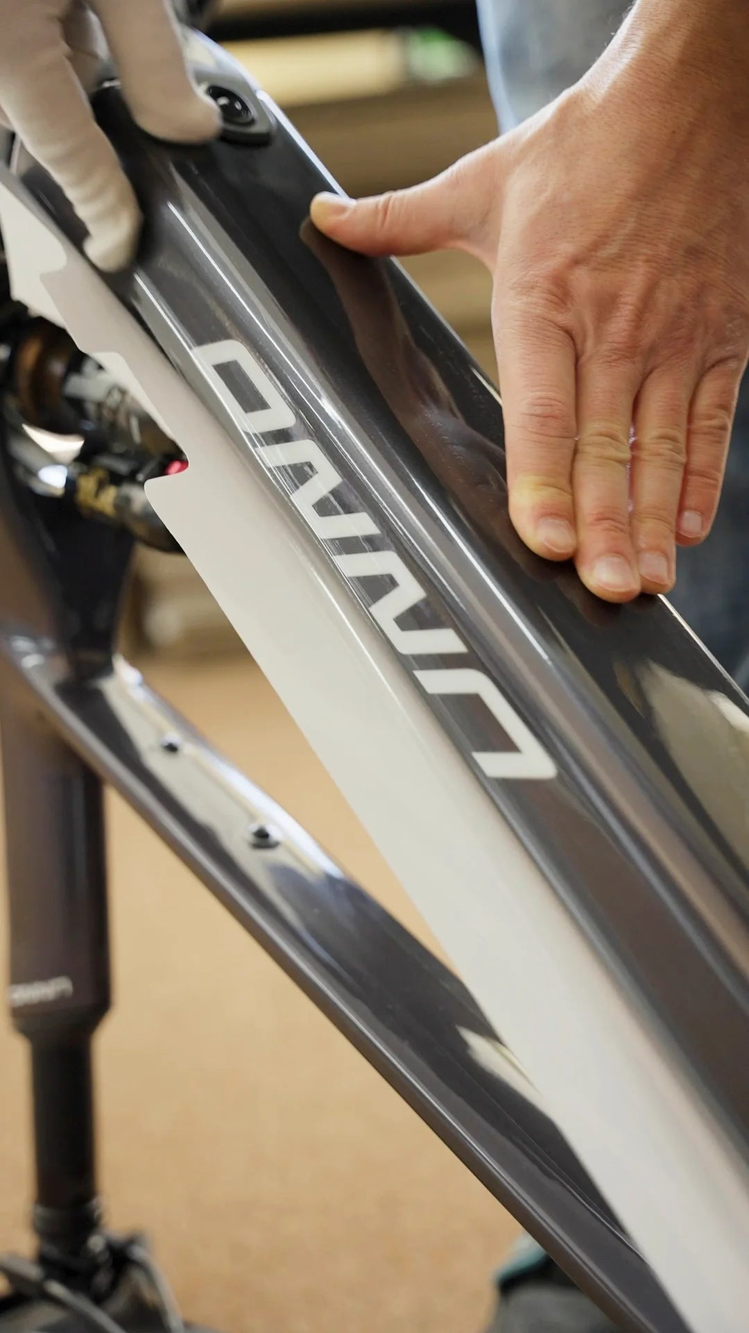 RideStyle glossy frame protection film for MTB, gravel and e-bike frames, providing transparent protection while preserving the original paint finish.